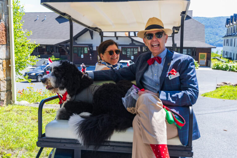 Jean and Peter Doliber with Connor during Silver Bay YMCA&rsquo;s Shortest 4th in the North parade in 2024.